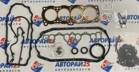Запчасть ремкомплект двс Nissan 1010113E85