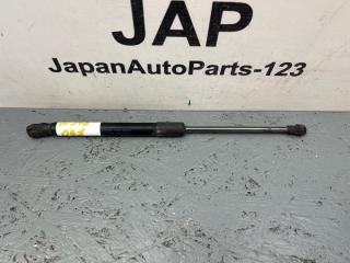 Амортизатор капота Volkswagen Touran 2011