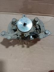 Суппорт тормозной задний левый TOYOTA Camry 2018