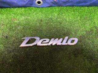 Эмблема MAZDA Demio 2002-2007 контрактная Эмблема MAZDA Demio 2002-2007