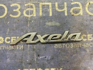 Запчасть эмблема MAZDA Axela 2003-2009