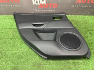 Запчасть обшивка двери задняя левая Mazda 3