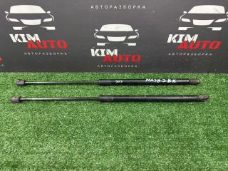 Запчасть упор крышки багажника Mazda 3