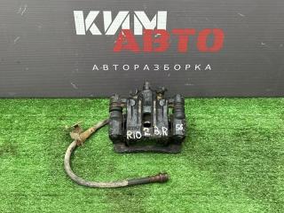 Суппорт тормозной задний правый Kia Rio 2