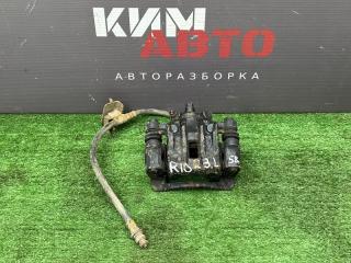 Суппорт тормозной задний левый Kia Rio 2