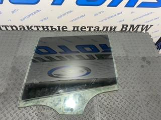Стекло двери заднее левое BMW