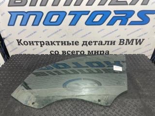 Стекло двери переднее левое BMW