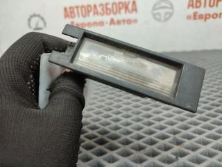 Фото запчасти фонарь подсветки номера Opel Zafira B 2009 Б/У запчасть Запчасть фонарь подсветки номера Opel Zafira B 2009