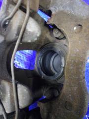 Суппорт тормозной передний левый Mazda Axela BK5P