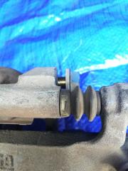 Суппорт тормозной задний левый Serena C25