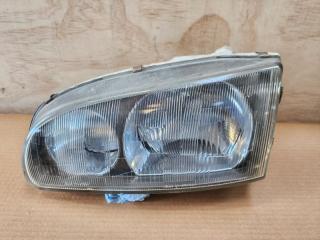 Headlight front left MITSUBISHI DELICA 1996