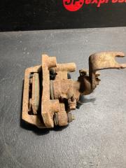 Суппорт тормозной задний левый 626 GE