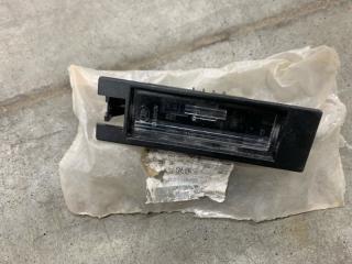 Запчасть фонарь подсветки номера Opel Astra