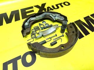 Колодки стояночного тормоза левые Lancer 10 2012 4B11T