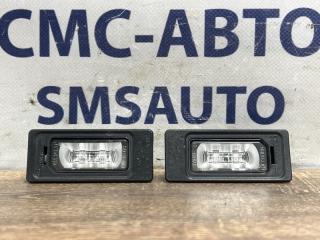 Фото запчасти фонарь подсветки номера Audi A6 2014 контрактная запчасть Запчасть фонарь подсветки номера Audi A6 2014