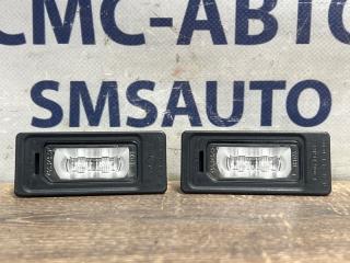 Фото запчасти фонарь подсветки номера Audi A7 2012 контрактная запчасть Запчасть фонарь подсветки номера Audi A7 2012