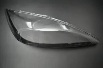 Запчасть стекло фары правое Toyota Camry 2004-2006 рест.