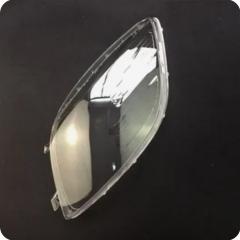 Запчасть стекло фары левое Toyota Yaris 2 2005-2009