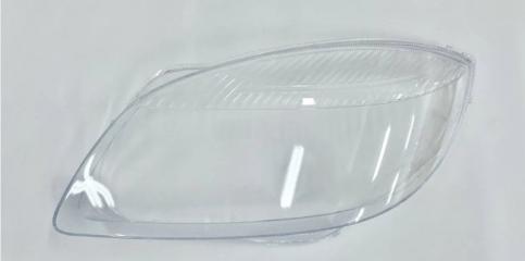 Запчасть стекло фары левое Skoda Fabia 2007-2010 дорест.