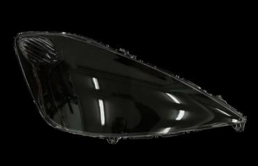 Запчасть стекло фары правое Honda Fit 2008-2010 дорест.