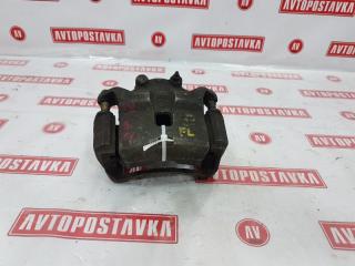 Суппорт тормозной передний левый NISSAN PRIMERA