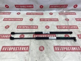 Запчасть амортизатор двери багажника задний правый MAZDA DEMIO