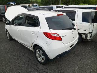 Замок двери левый задний MAZDA DEMIO DE3FS ZJVE D65173310 2 ракурс