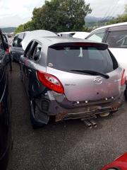 Замок двери левый задний MAZDA DEMIO DE5FS ZYVE D65173310 3 ракурс