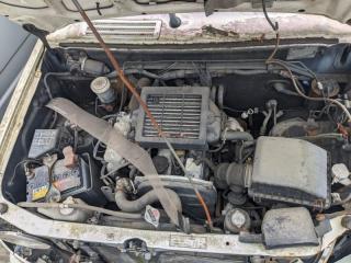 Тросик ручника правый задний MITSUBISHI PAJERO MINI H56A 4A30 MR128812 2 ракурс