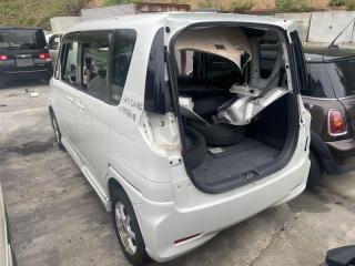 Доводчик двери правый задний SUZUKI SOLIO MA15S K12B 8310582K21 2 ракурс