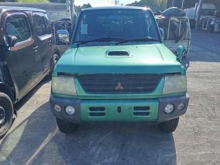 Бампер передний MITSUBISHI PAJERO MINI H58A 4A30 MR414496, MR465804, MR465803 4 ракурс