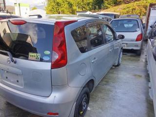 Замок 5-й двери NISSAN NOTE E11 HR15DE 90502EN00A 1 ракурс