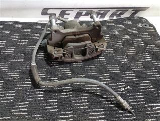 Суппорт тормозной передний левый Volkswagen Passat 2006