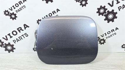 Фото запчасти лючок топливного бака Mitsubishi Lancer 9 2006 контрактная запчасть Запчасть лючок топливного бака Mitsubishi Lancer 9 2006