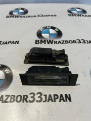 Запчасть плафон освещения номерного знака BMW Е87 2008