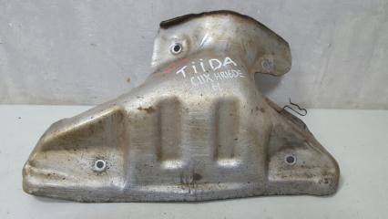 Фото запчасти кожух выпускного коллектора тепловой экран Nissan Tiida 2008 Б/У запчасть Запчасть кожух выпускного коллектора тепловой экран Nissan Tiida 2008