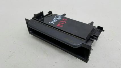 Фото запчасти накладка торпеды Daihatsu Storia 2003 Б/У запчасть Запчасть накладка торпеды Daihatsu Storia 2003