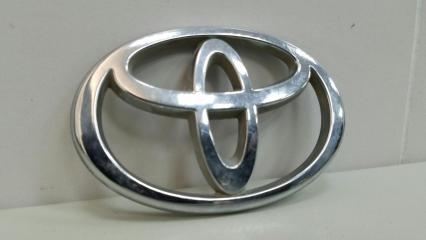 Фото запчасти эмблема Daihatsu Storia 2003 Б/У запчасть Запчасть эмблема Daihatsu Storia 2003