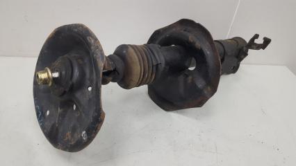 Амортизатор стойка передний левый Nissan Laurel 2001