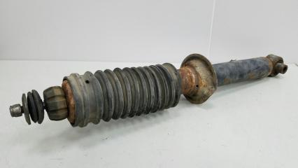 Амортизатор стойка задний левый Nissan Primera 1992г