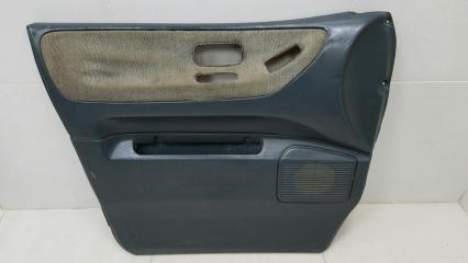 Обшивка карта двери передняя левая Nissan Largo 1994