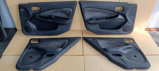 Обшивка карта двери комплект Nissan Almera 2003