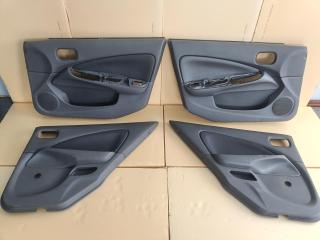 Обшивка карта двери комплект Nissan Almera 2004