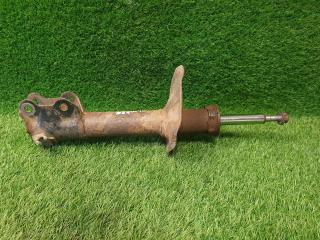 Амортизатор стойка передний левый Nissan Almera 2003