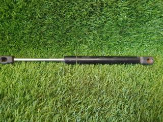 Амортизатор крышки двери багажника Nissan Primera 2000