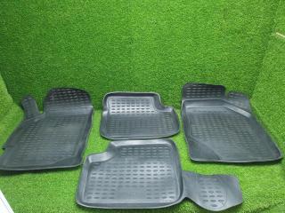 Фото запчасти комплект салонных ковриков Kia Spectra 2009 Б/У запчасть Запчасть комплект салонных ковриков Kia Spectra 2009