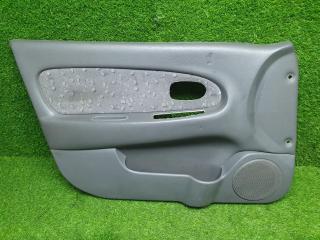 Фото запчасти обшивка карта двери передняя левая Kia Spectra 2006 Б/У запчасть Запчасть обшивка карта двери передняя левая Kia Spectra 2006