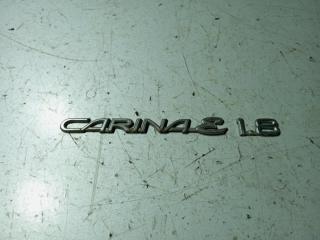 Запчасть эмблема крышки багажника Toyota Carina E