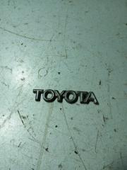Запчасть эмблема крышки багажника Toyota Carina E