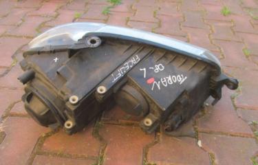 Фара левая Touran 2003-2015